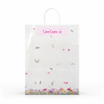 Bolsas transparentes con manija y diseños. FLORES